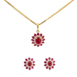 Oval Ruby Pendant Set in Gold and Diamonds